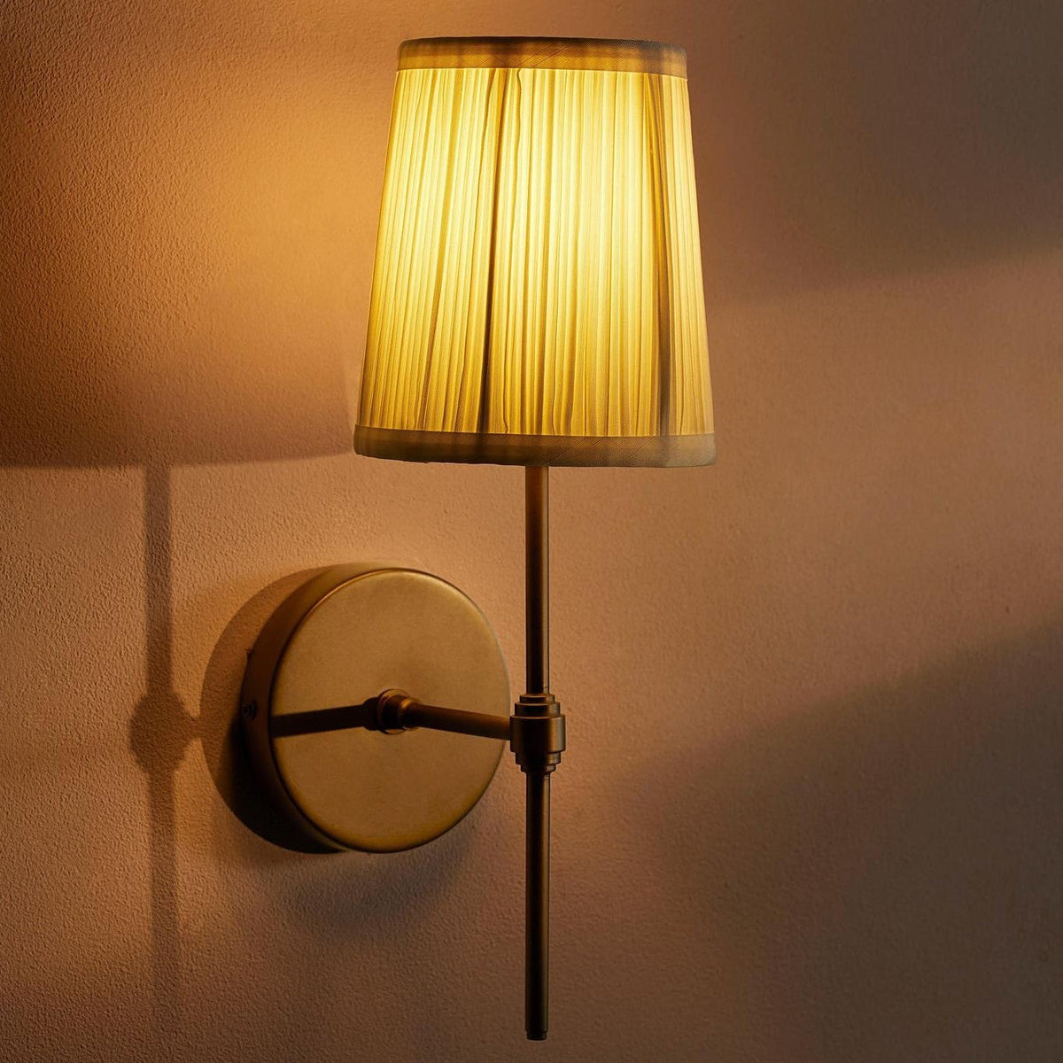 Anise Wall Light. Antiqued Brass