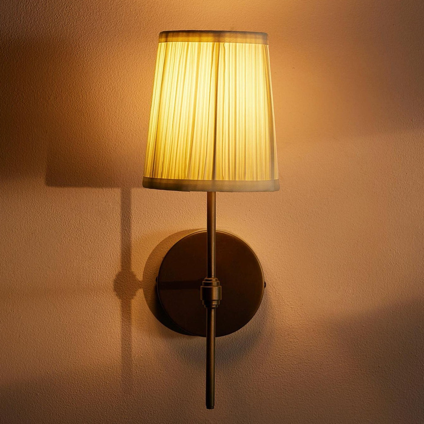 Anise Wall Light. Antiqued Brass