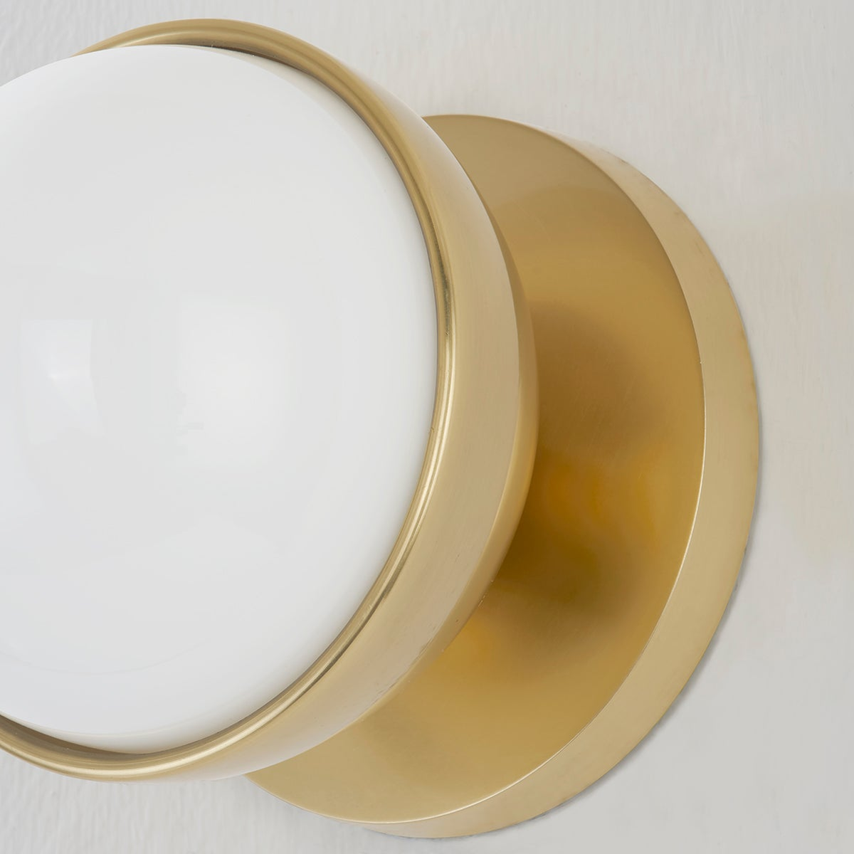 Sia Aged Brass Globe Vanity Sconce