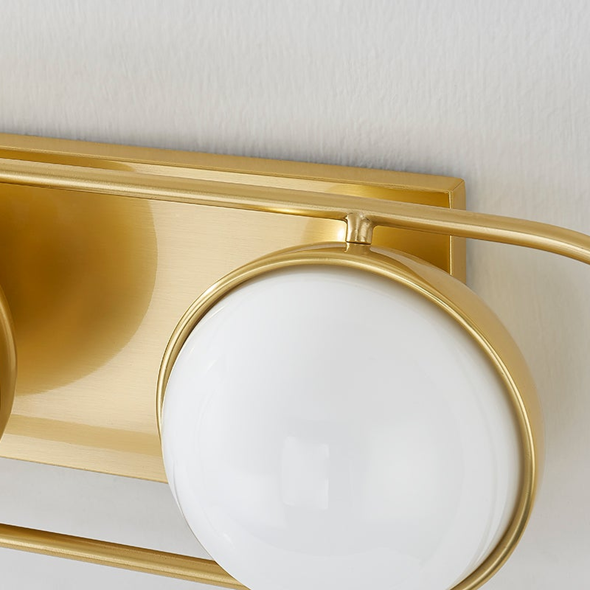Sia Aged Brass Globe Vanity Sconce
