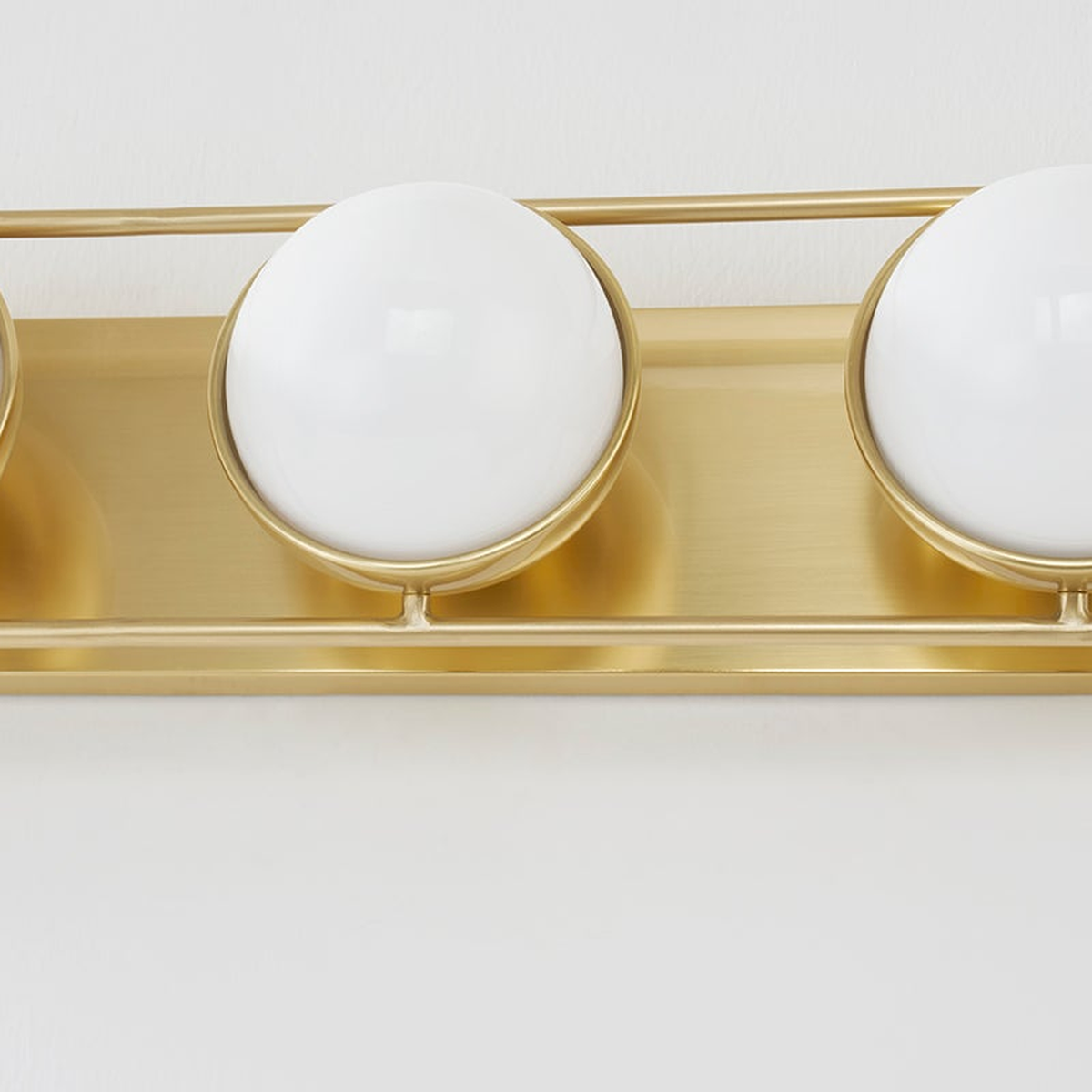 Sia Aged Brass Globe Vanity Sconce