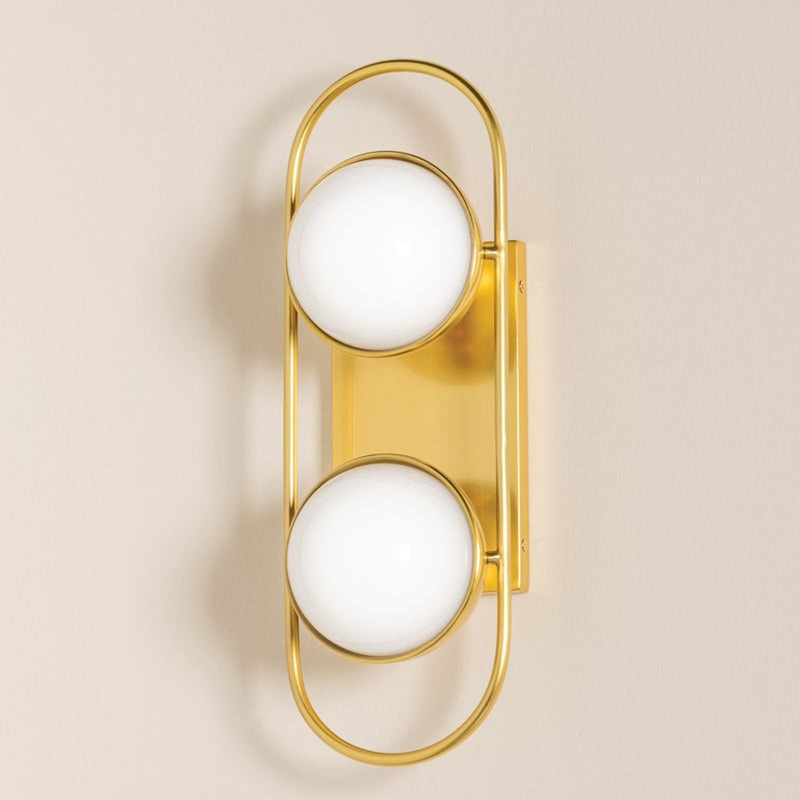 Sia Aged Brass Globe Vanity Sconce