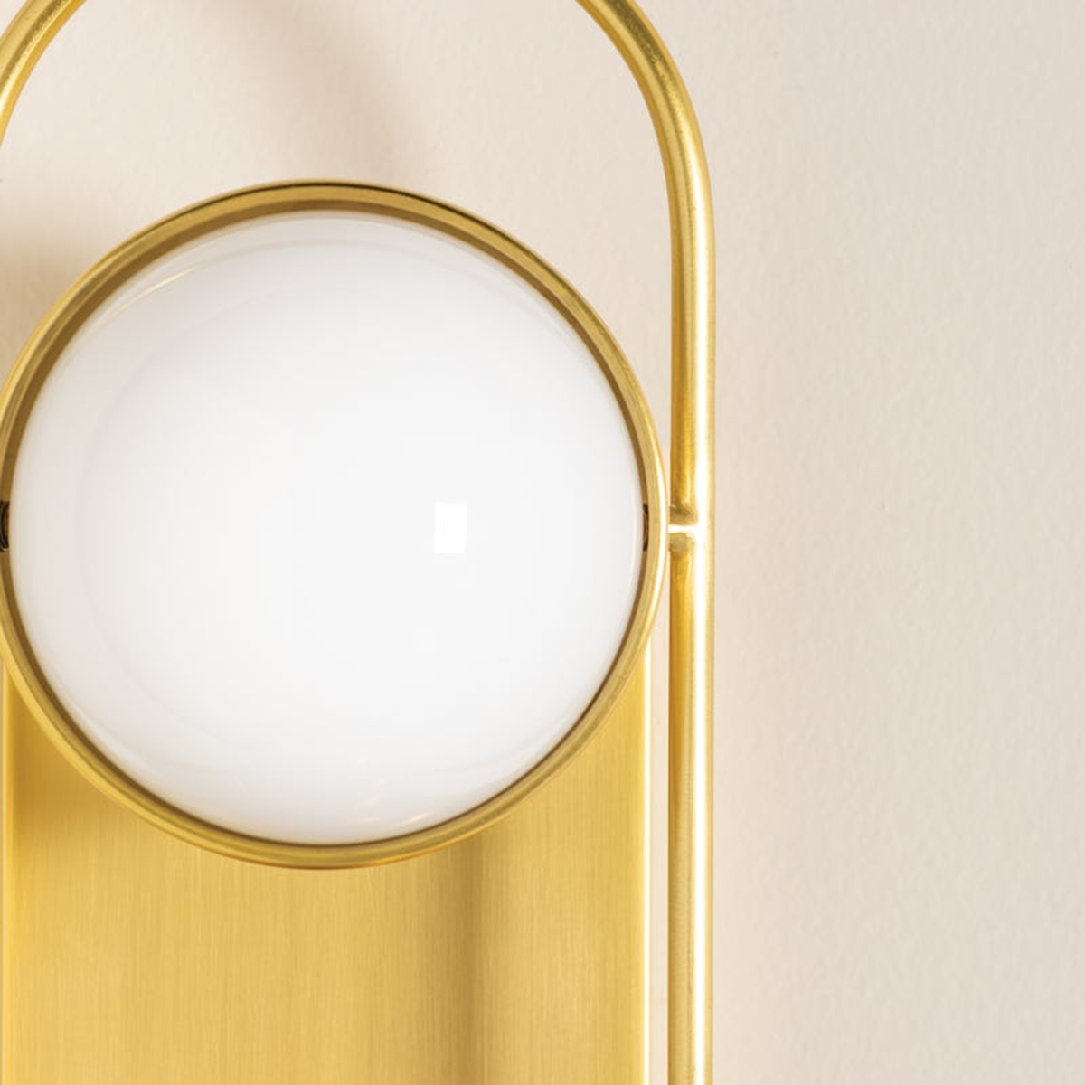 Sia Aged Brass Globe Vanity Sconce